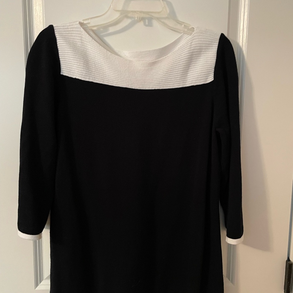 Two Black and white sweaters. Two for price of one